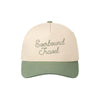 two tone sage trucker hat with custom everbound travel embroidered design 