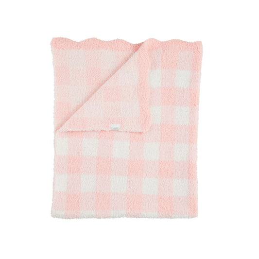 Pink and white checkered blanket on a white background
