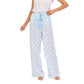 Light blue and white checkered pajama pants worn by a person on a white background