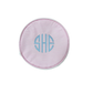 Round pink and white striped fabric patch with blue monogram initials on a white background