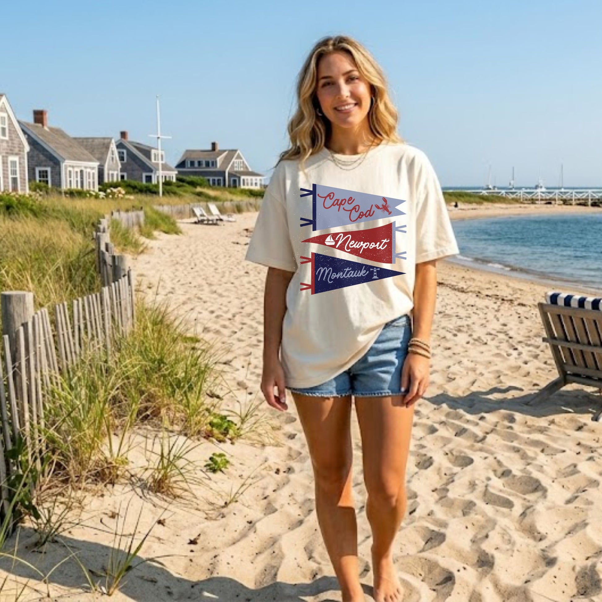 Woman wearing a t-shirt with coastal flags design on a beach