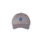 grey cap with a blue embroidered vmm barn logo 