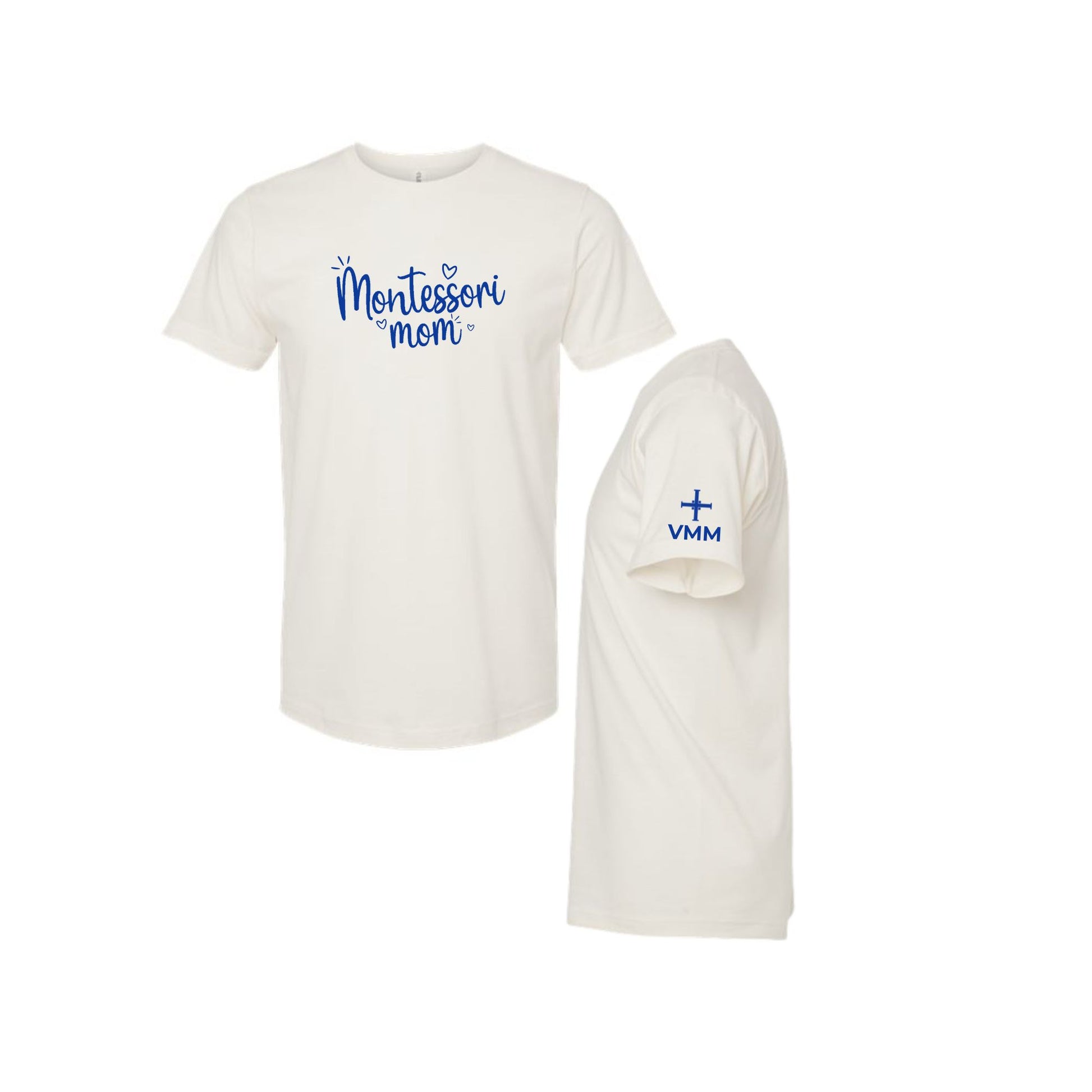 An off-white short-sleeve t-shirt shown from two angles: a front view featuring the blue text 'Montessori mom' and a small heart, and a side/back view showing a blue cross with 'VMH' on the sleeve.