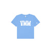 A light blue short-sleeve t-shirt with 'VMM' printed in bold white block letters across the chest and a small white 'cross' logo on the left sleeve, shown on a plain white background.