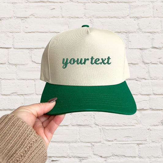 two toned canvas and green hat with custom embroidered text in green thread