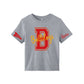 A kids' heather gray short-sleeve t-shirt featuring a large red and yellow 'B Bulldogs' graphic on the front, with a red 'Cheer' pennant on the left sleeve and 'Name' text on the right sleeve, shown on a plain white background.
