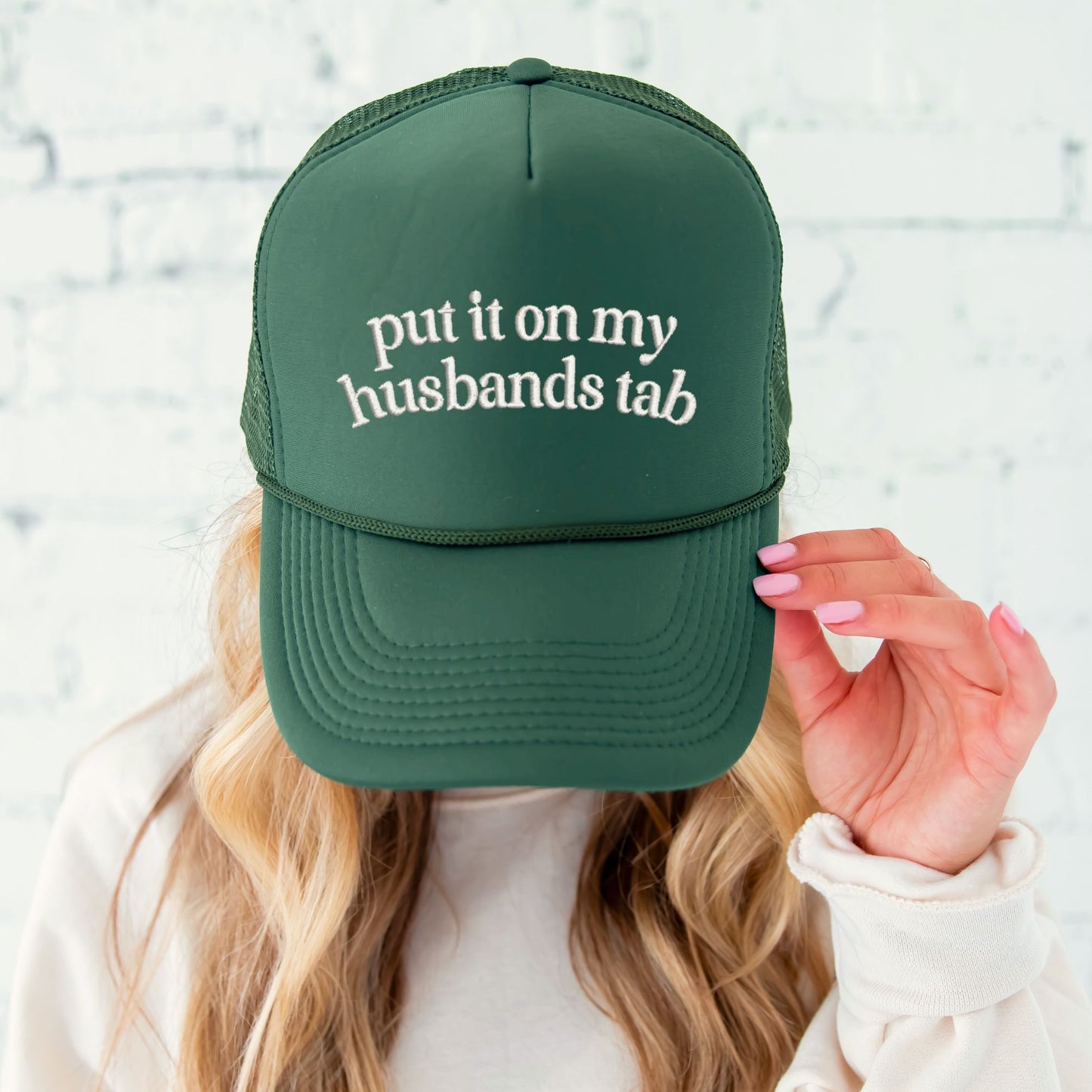 Put It on My Husband's Tab Embroidered Trucker Hat