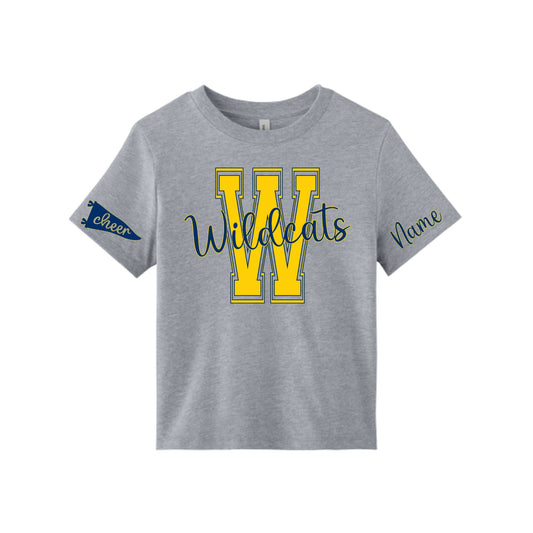 A heather gray short-sleeve t-shirt with a large yellow and navy blue 'W' graphic and the word 'Wildcats' across the chest, featuring a navy blue ' cheer' patch on one sleeve and 'Name' in script on the other.