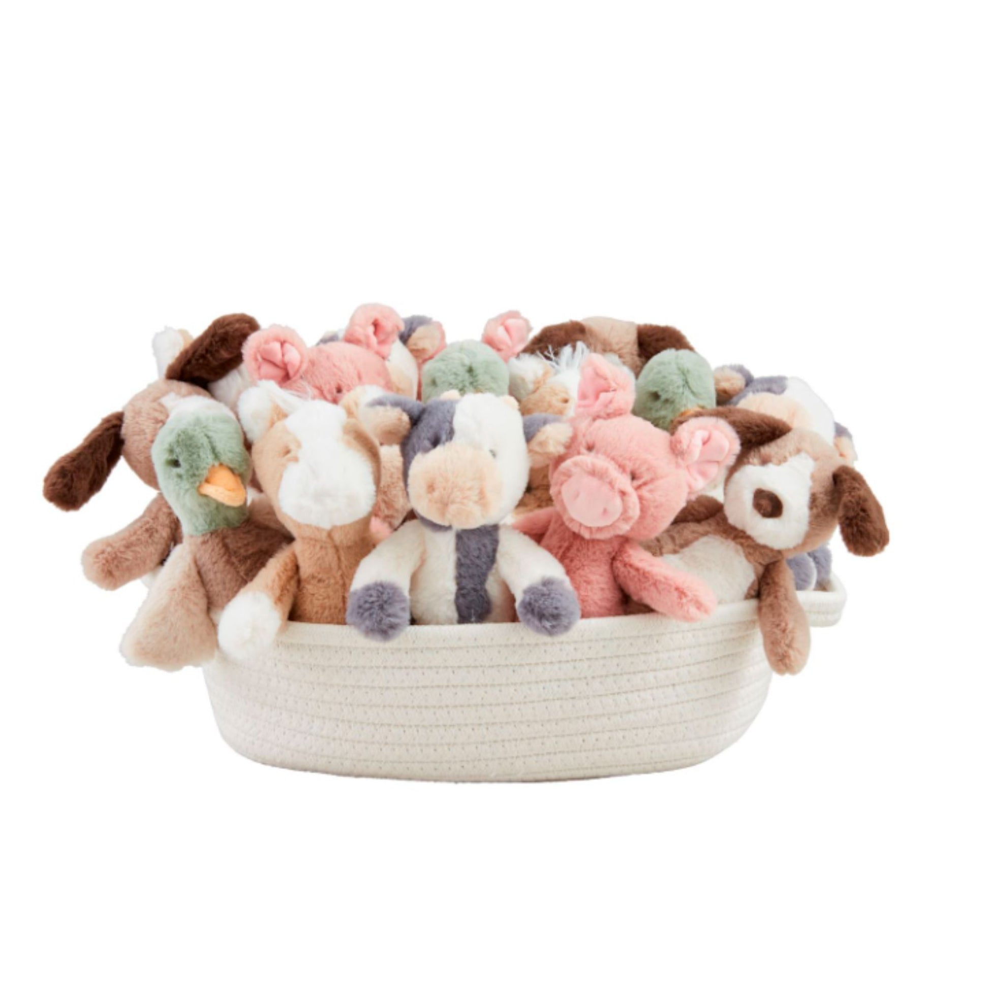 Collection of soft plush toys in a woven basket on a white background