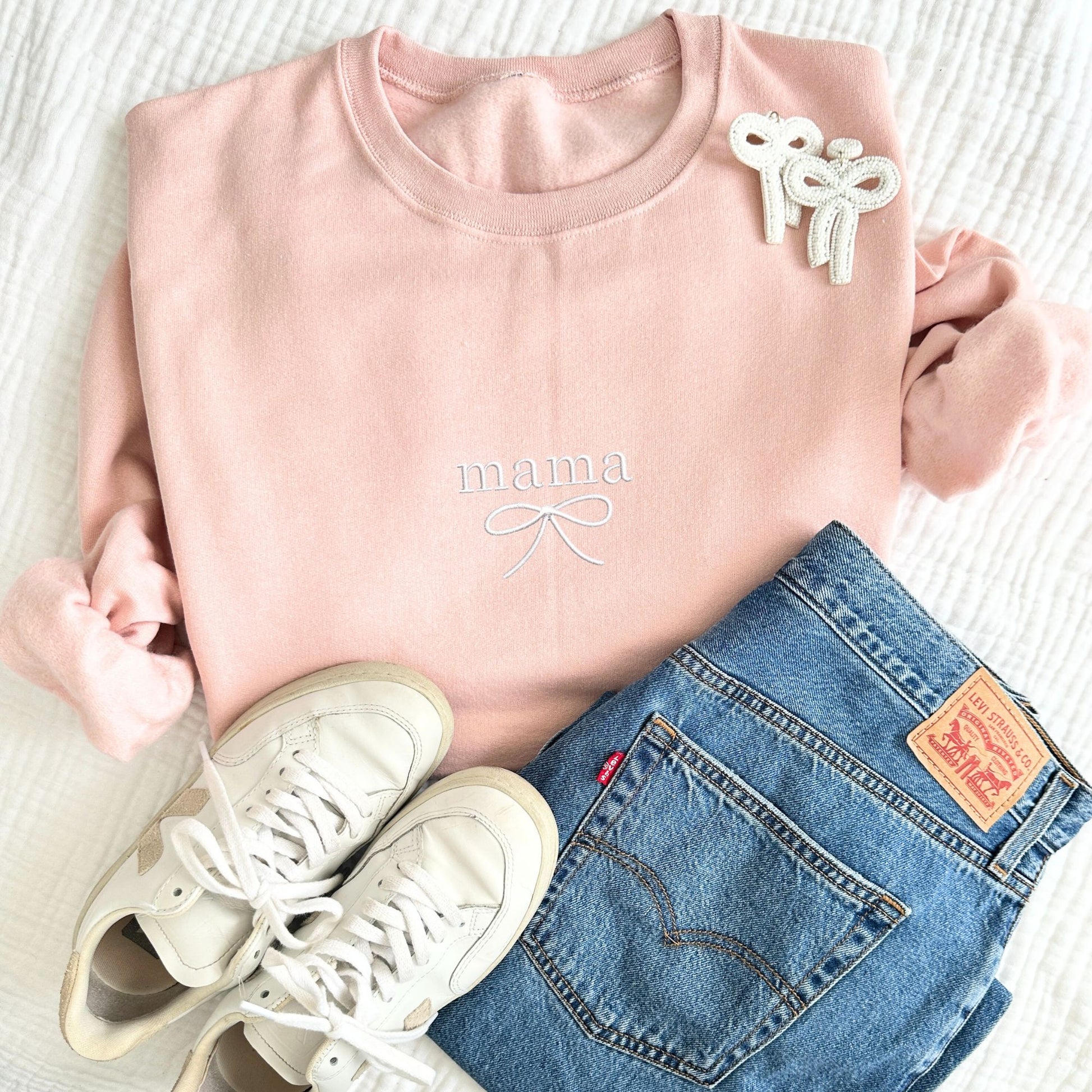 blush pink crewneck with custom name/dainty bow embroidered design on the center chest