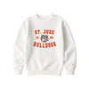An off-white crewneck sweatshirt featuring a red and gray graphic print on the front that reads 'ST. JUDE BULLDOGS 1958' with a bulldog mascot illustration.