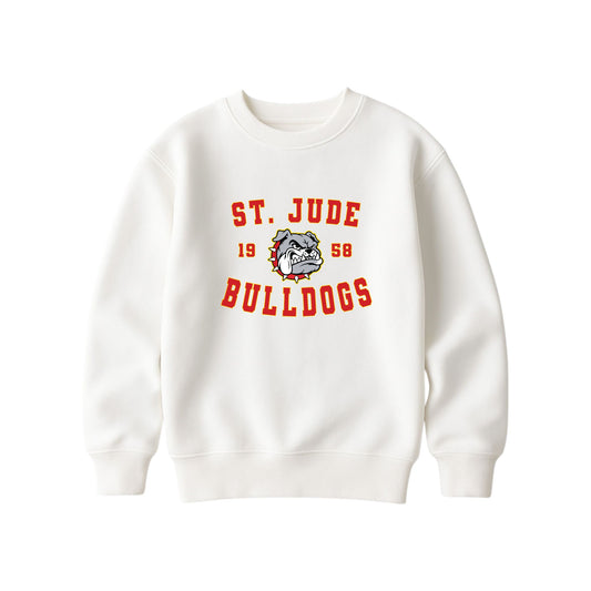An off-white crewneck sweatshirt featuring a red and gray graphic print on the front that reads 'ST. JUDE BULLDOGS 1958' with a bulldog mascot illustration.