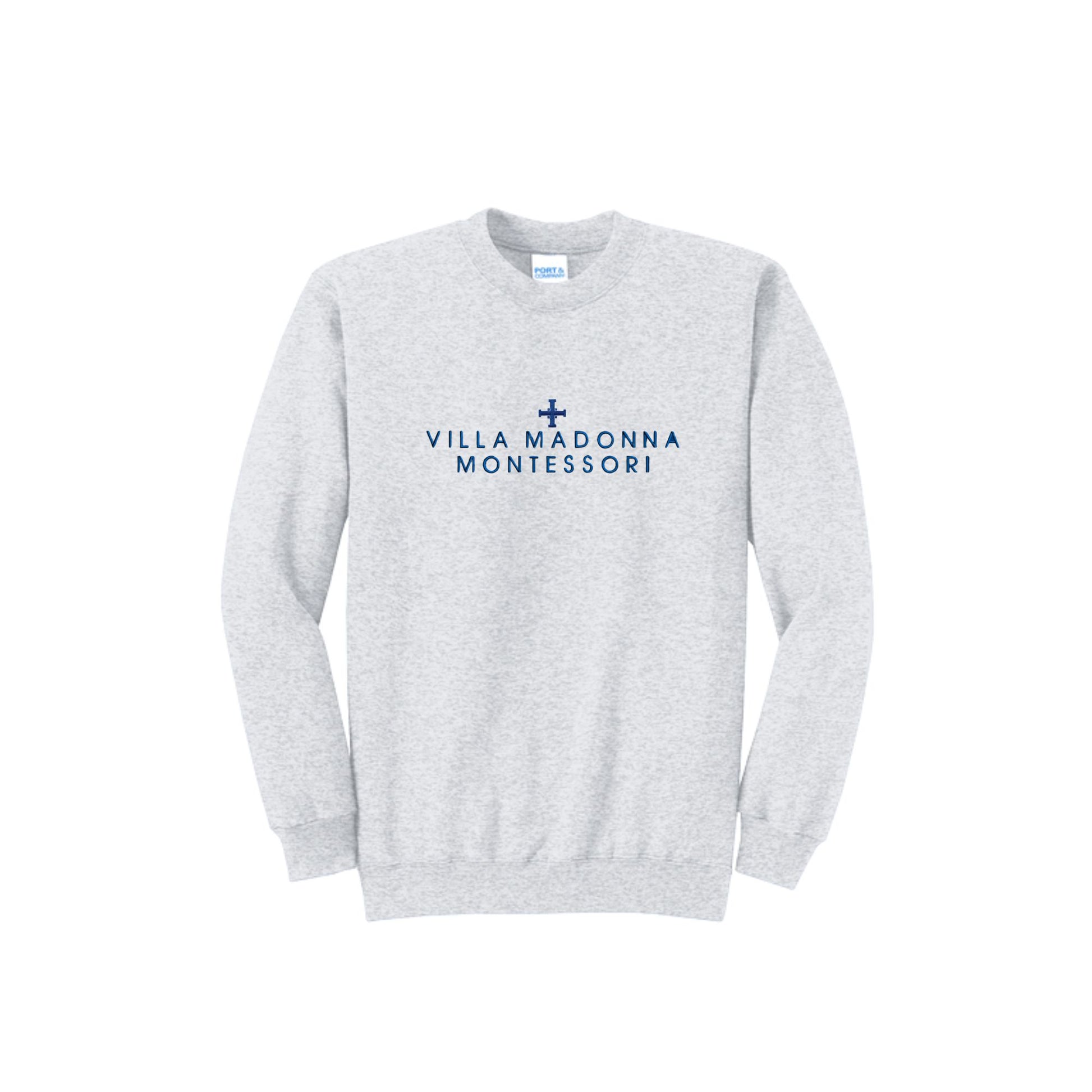 A light heather gray crewneck sweatshirt featuring the text 'VILLA MADONNA MONTESSORI' and a small blue cross printed on the chest, displayed on a clean white background.