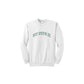 White sweatshirt with embroidered 'ST PIUS X' varsity font design on the center chest in hunter green thread