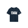 A navy blue short-sleeve t-shirt with 'VMM' printed in bold white block letters across the chest and a small white cross logo on the left sleeve, shown on a plain white background.