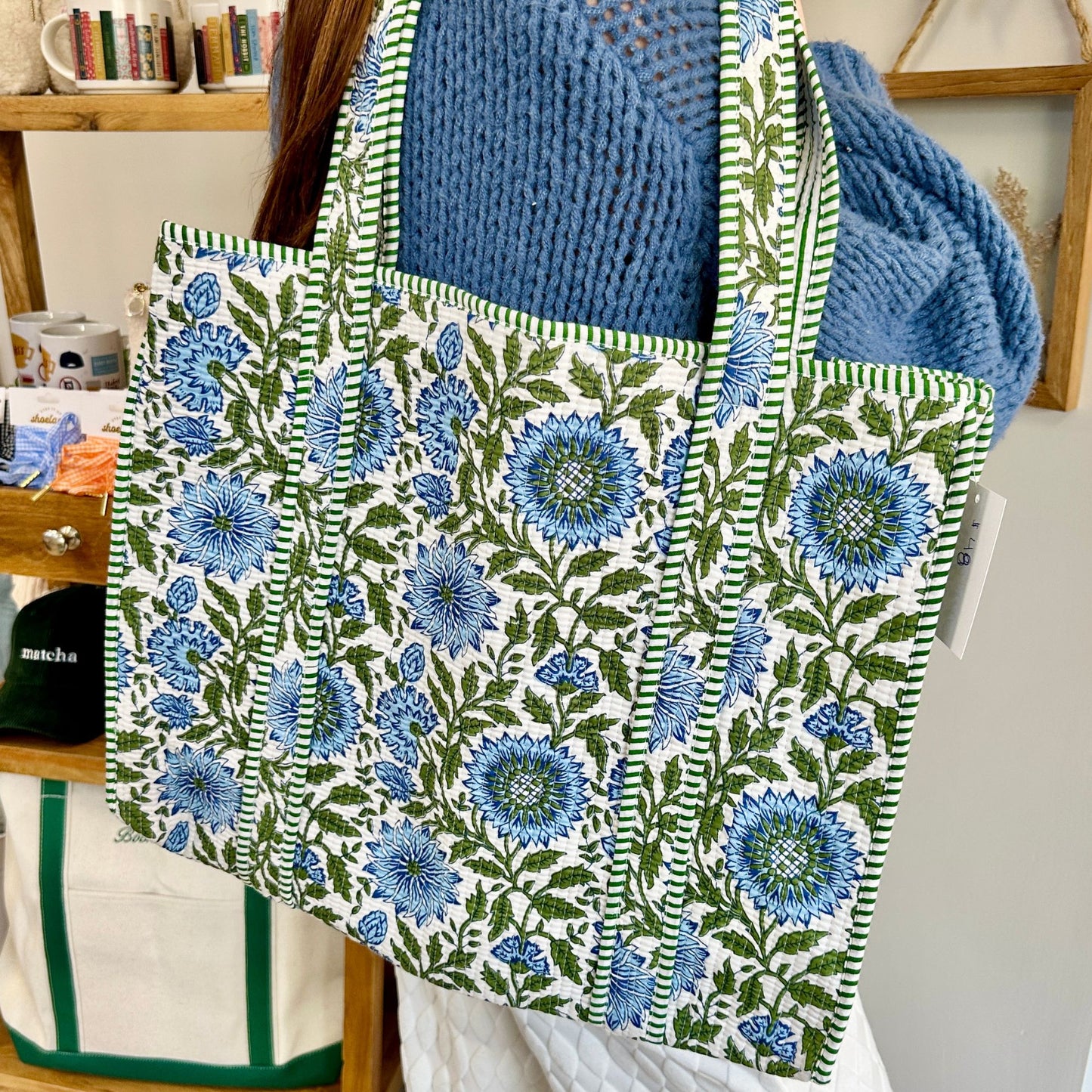 Floral patterned tote bag with green and blue design