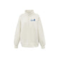 An off-white quarter-zip sweatshirt with a blue 'Villa Madonna Montessori' logo printed on the left chest, displayed on a clean white background.