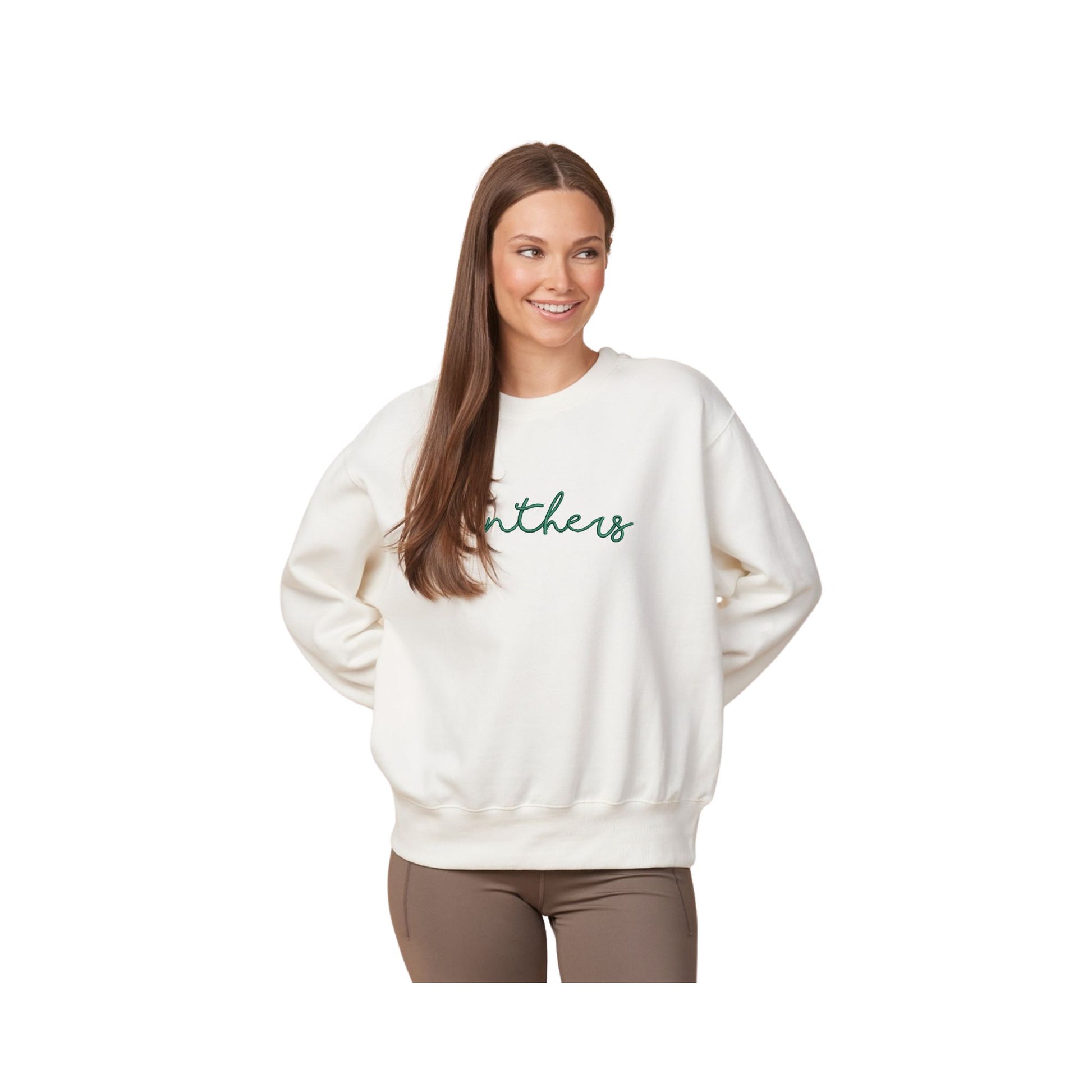 woman wearing a ladies boxy bleached linen crewneck with embroidered panthers design in script font on the front center chest with hunter green thread