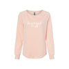 blush wave wash women's crewneck with a be a friend to all sacred heart schools print in red across the chest