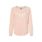 blush wave wash women's crewneck with a be a friend to all sacred heart schools print in red across the chest
