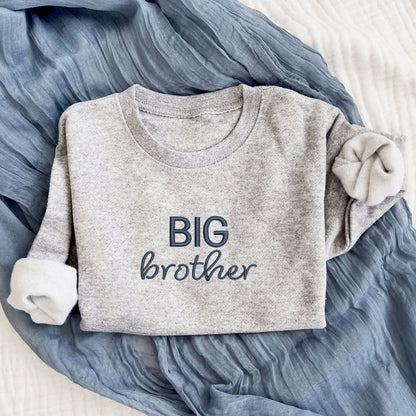 Heather crewneck with custom BIG brother embroidered design in navy thread