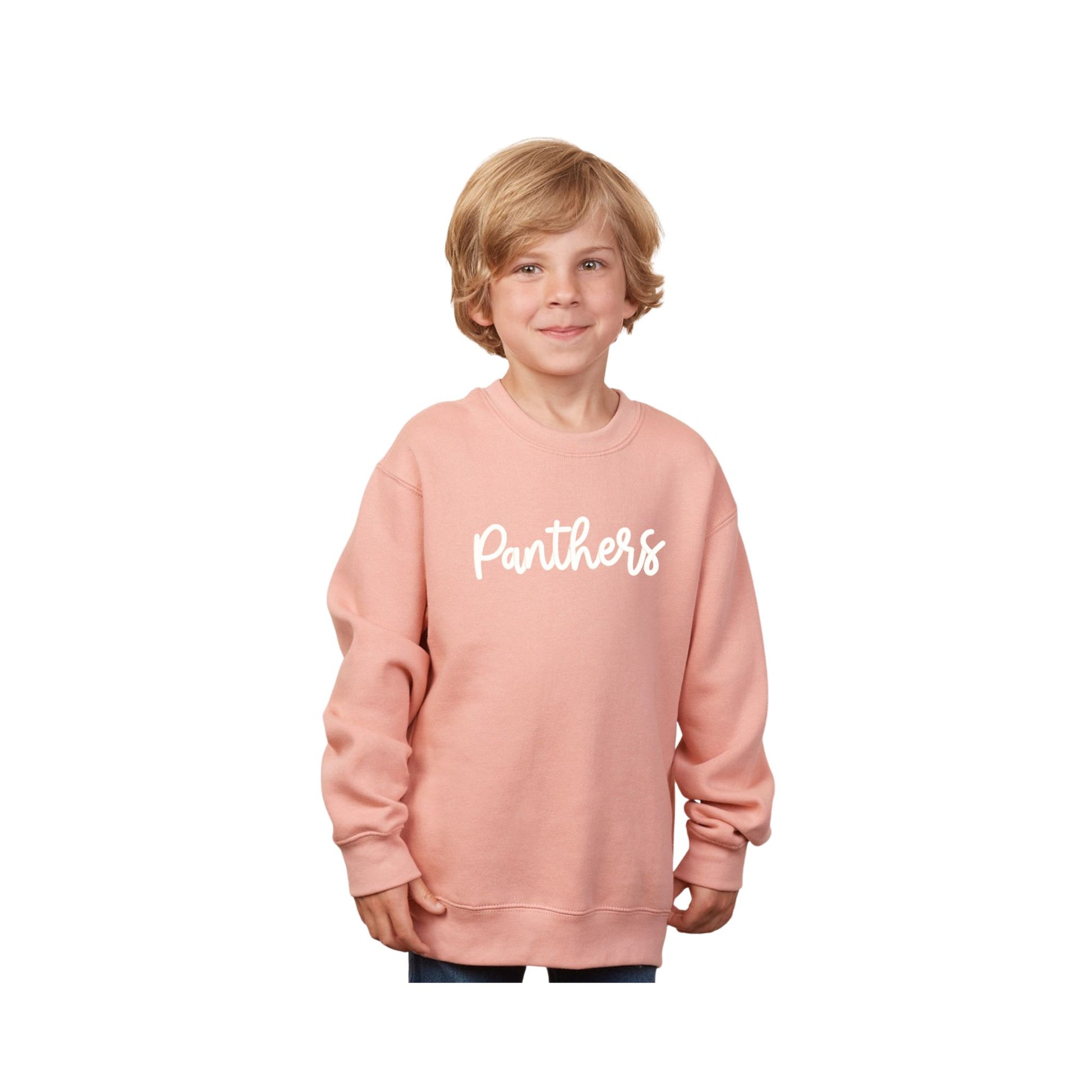 Child wearing a pink sweatshirt with 'Panthers' text on a white background