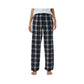 boy wearing black and white plaid pajama pants