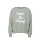 A sage green crewneck sweatshirt with the phrase 'move the chains!' printed in white script across the chest, displayed on a clean white background.