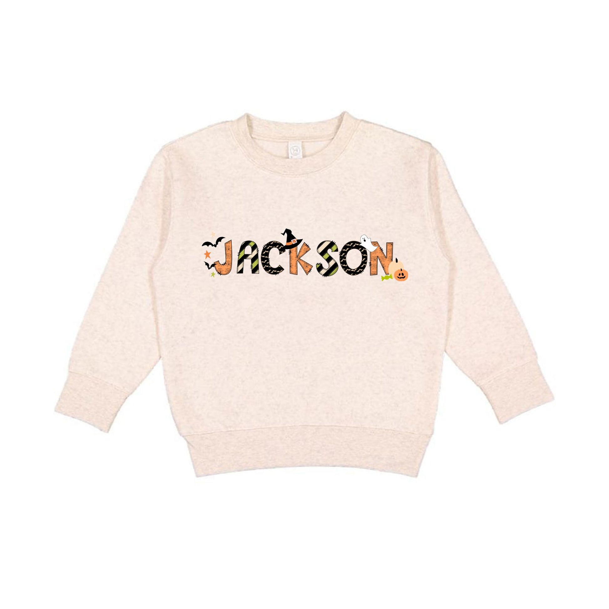 Natural heather crewneck sweatshirt with a custom name print in a mixed patterned Halloween text and accented with cute spooky icons like bats, a ghost, jack-o-lantern, and witch hat.