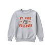 A light gray crewneck sweatshirt featuring a red and white graphic on the chest that reads 'ST. JUDE BULLDOGS' with '1958' and a bulldog mascot logo in the center.