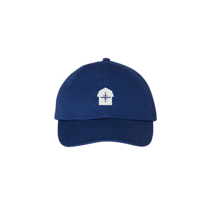 Blue cap with a white vmm barn logo 