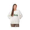 Woman wearing a white sweatshirt with 'others' printed on it against a white background
