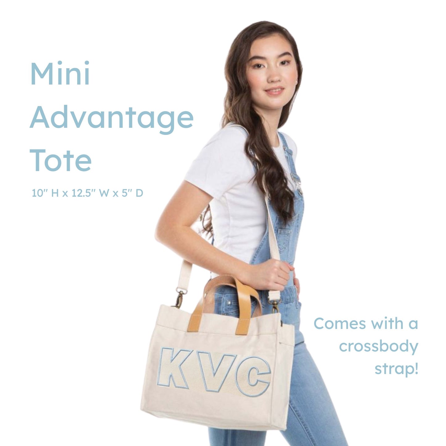 Woman holding a beige tote bag with 'KVC' branding, white background