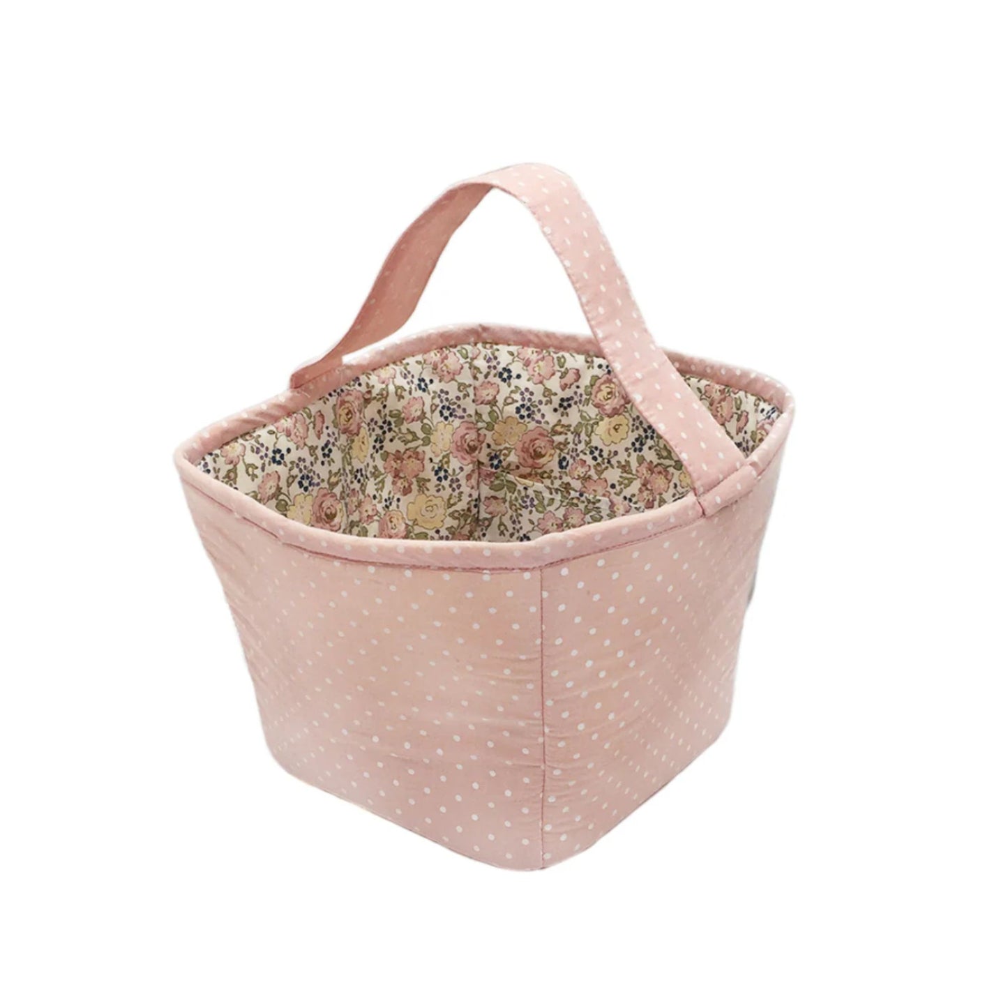 Pink fabric basket with floral interior on a white background