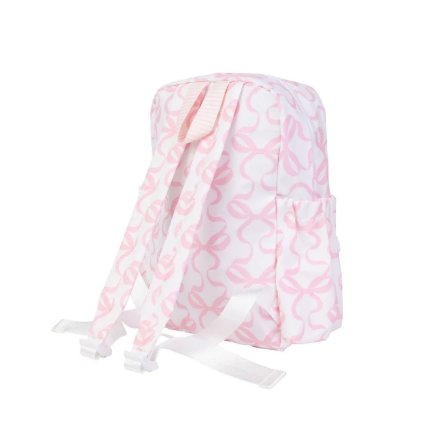 back of a Pink and white bow patterned backpack on a white background