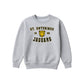 A light gray crewneck sweatshirt featuring a yellow and black graphic on the chest that reads 'ST. ANTONINUS JAGUARS' with '1948' and a jaguar head logo in the center.