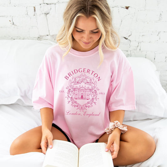 Jada is wearing a large blossom tee with the hot pink bridgerton print