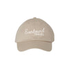 Beige cap with 'Everbound Travel' text on a white background