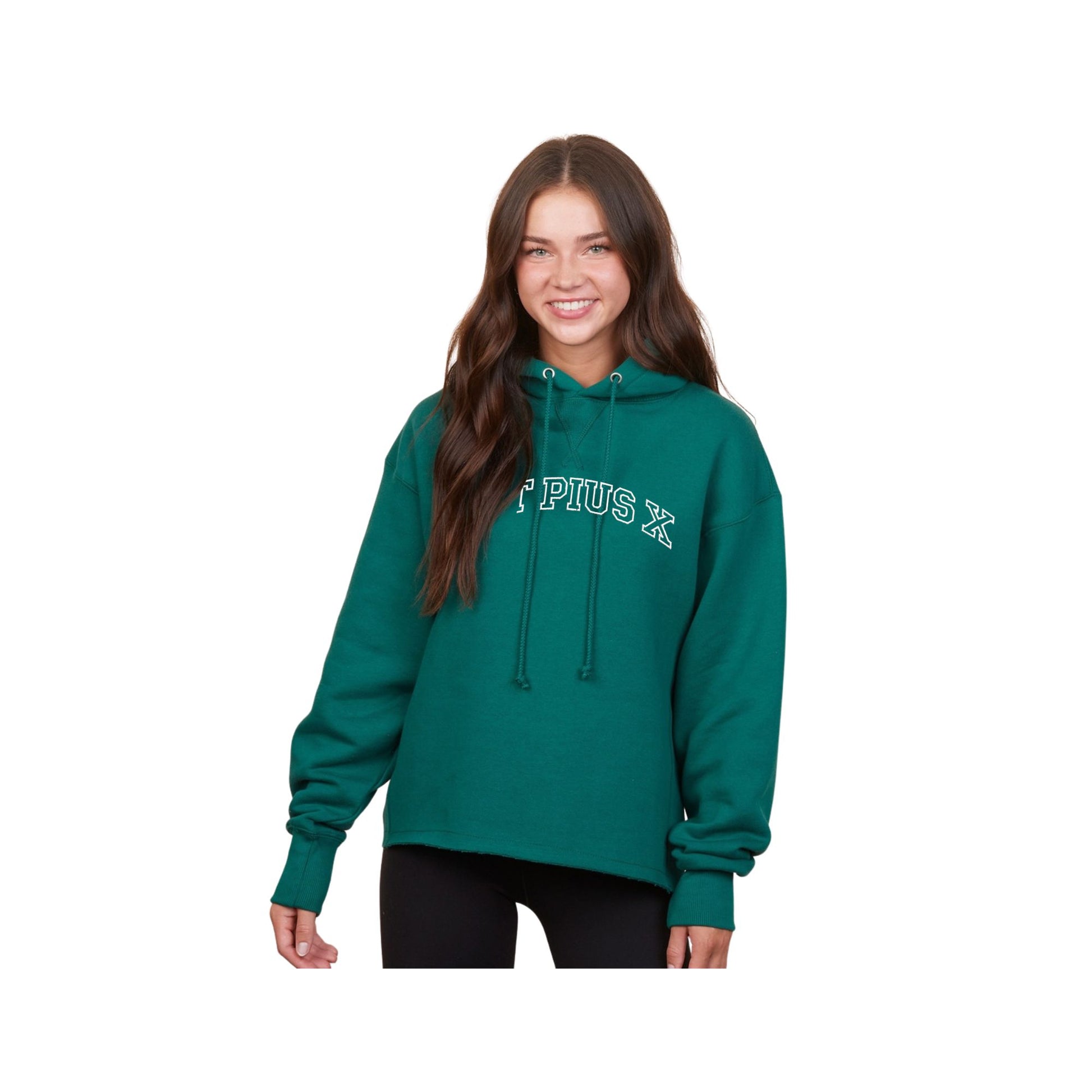 Woman wearing a green hoodie with 'Pius X' text on a white background