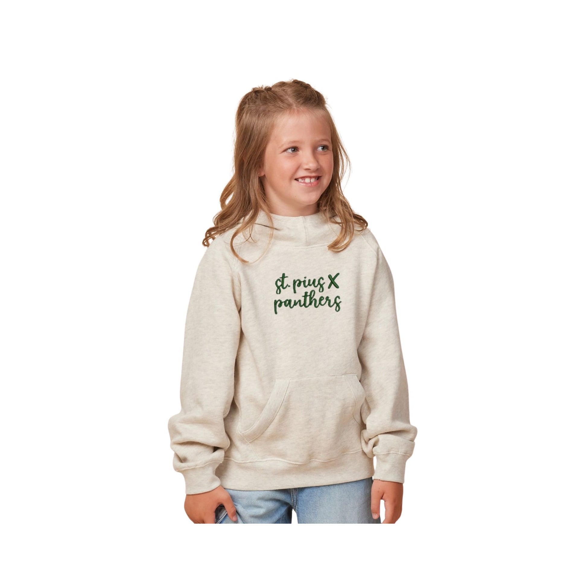 Young girl wearing a beige hoodie with text on a white background