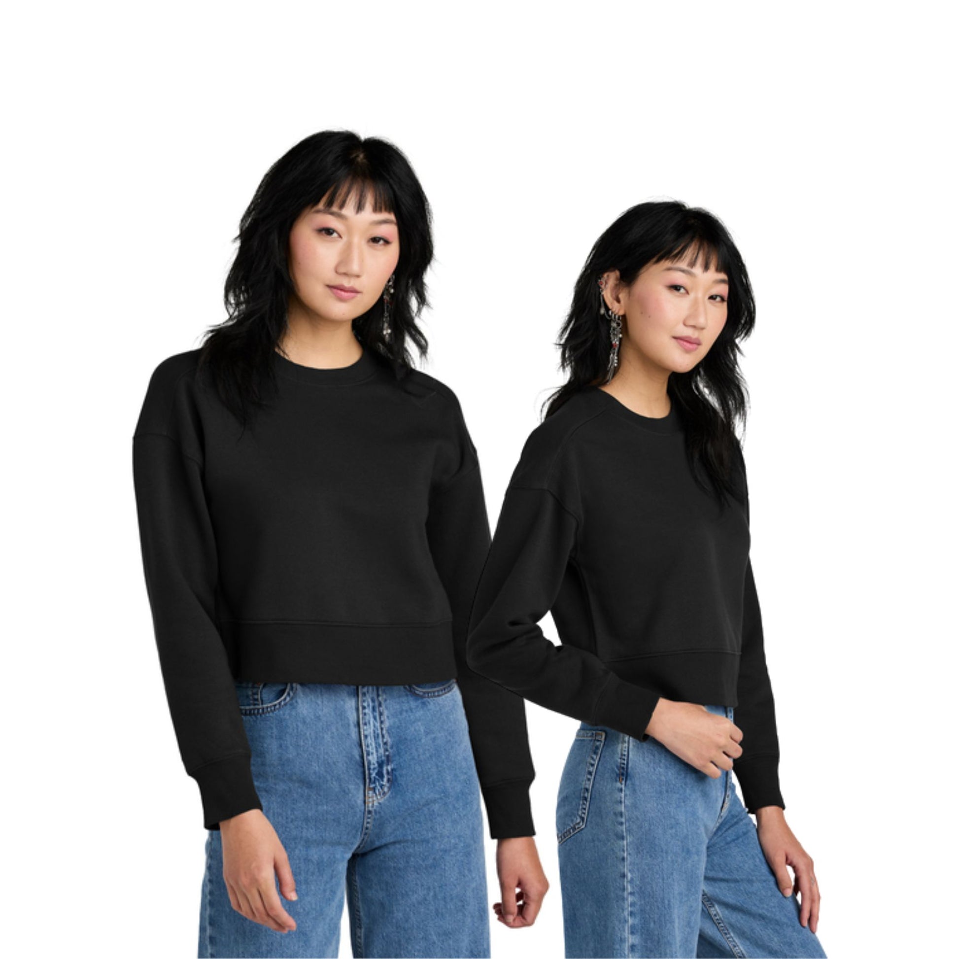 woman wearing a black cropped crewneck sweatshirt
