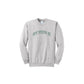 Ash sweatshirt with embroidered 'ST PIUS X' varsity font design on the center chest in hunter green thread