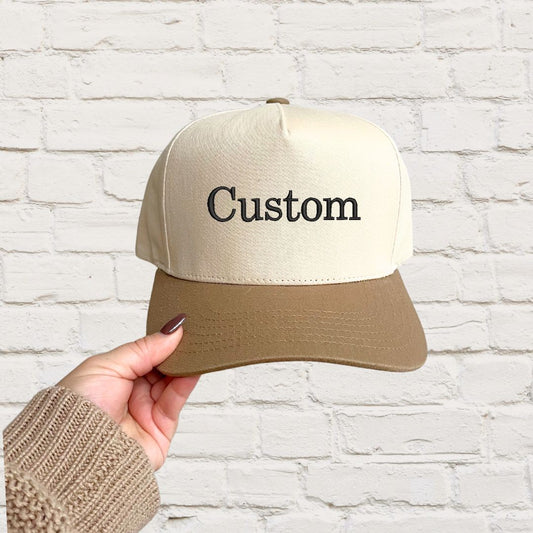 two toned canvas and beige hat with custom embroidered text in black thread