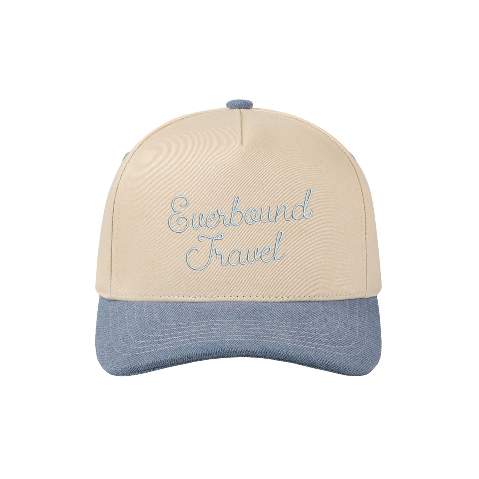 two tone light denim trucker hat with custom everbound travel embroidered design 