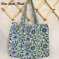 Floral-patterned bag with blue flowers on a white background