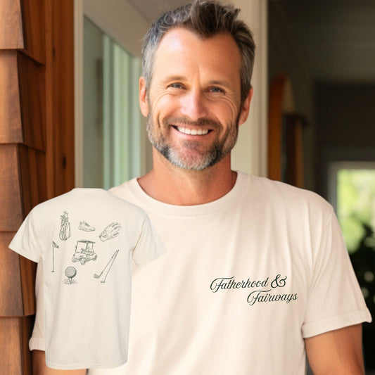 man wearing an ivory comfort colors t-shirt with a fatherhood & fairways design in green on the front left chest and vintage inspired sketched golf icons design in green on the back 