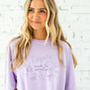 girl wearing an orchid comfort colors t-shirt with custom made to worship printed design featuring cute Christian themed drawn icons