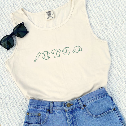 an ivory comfort colors tank top with a custom baseball icons embroidered design across the chest in hunter green thread paired with jean shorts and sunglasses