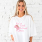 girl wearing a white comfort colors t-shirt with custom tis so sweet to trust in jesus strawberry print design