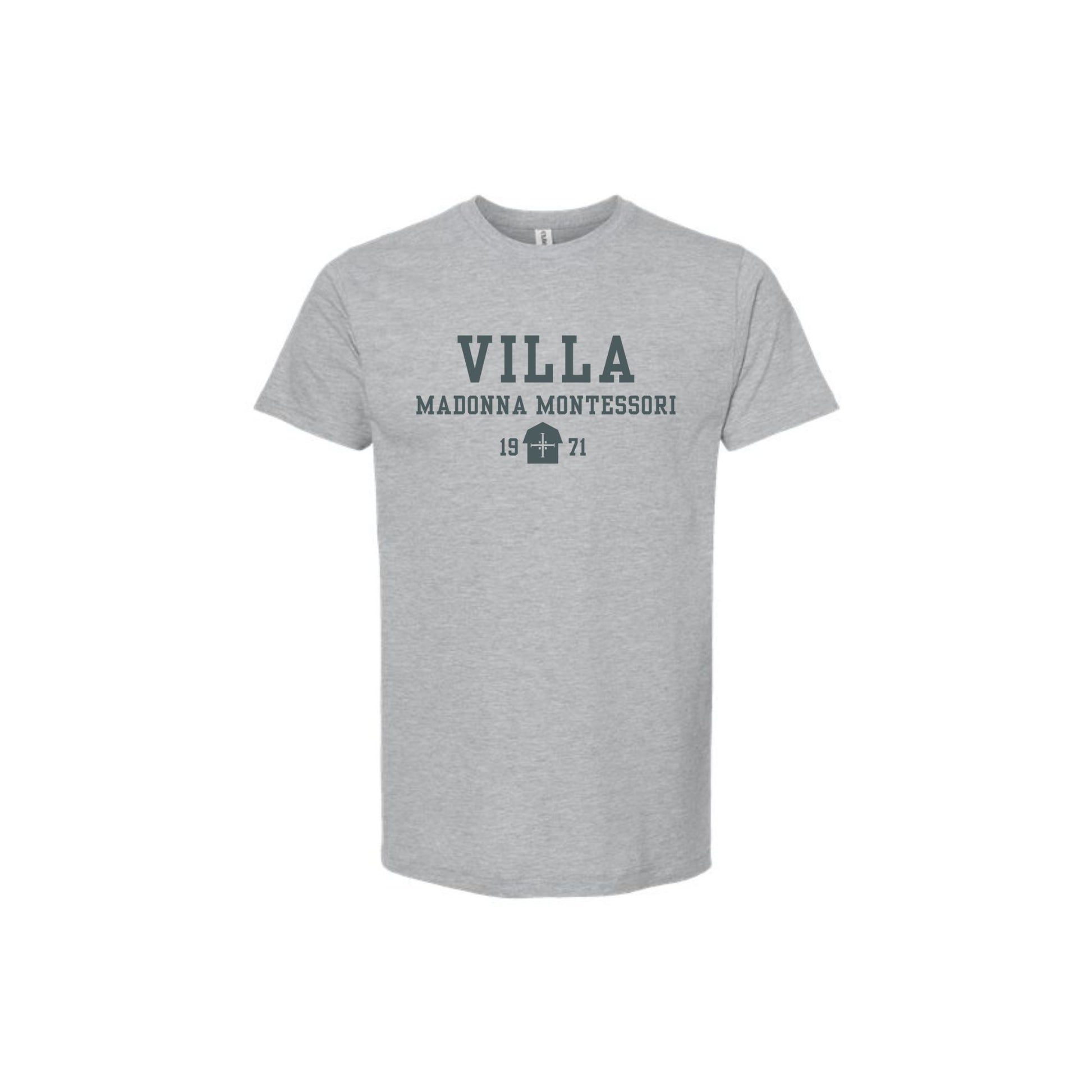 A light heather gray short-sleeve t-shirt with a dark gray graphic print on the chest reading 'VILLA MADONNA MONTESSORI 1871' and a small building icon, shown on a plain white background.
